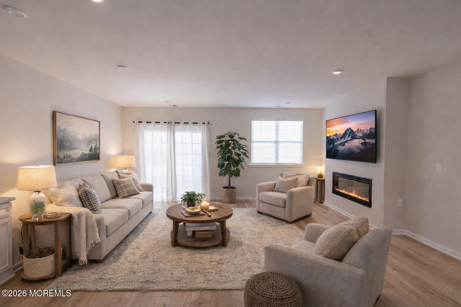 16 Chapel Lane Neptune, NJ 07753 - Photo 3 of 27 a living room with furniture fireplace and flat screen tv