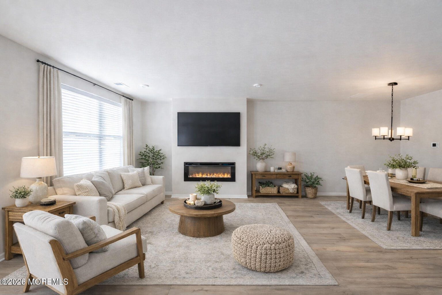 16 Chapel Lane Neptune, NJ 07753 - Photo 5 of 27 a living room with furniture fireplace and a large window