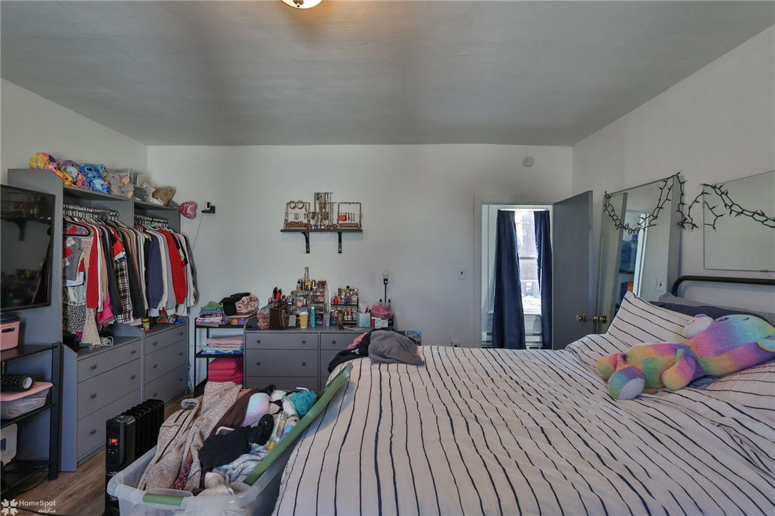 115 East Ruddle Street Coaldale, PA 18218 - Photo 50 of 57 Smooth plaster walls and rich wood floors anchor this comfortable bedroom space.
