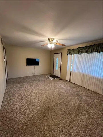 a view of a livingroom with a fireplace