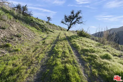 a view of an outdoor space and mountains