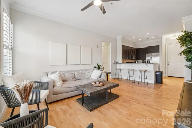 a kitchen with a refrigerator and a stove