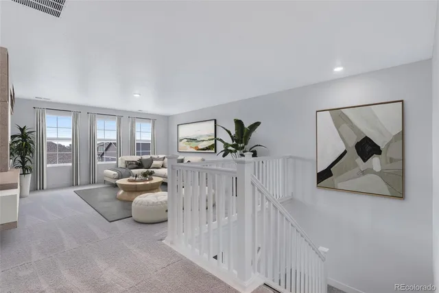 a view of living room filled with furniture