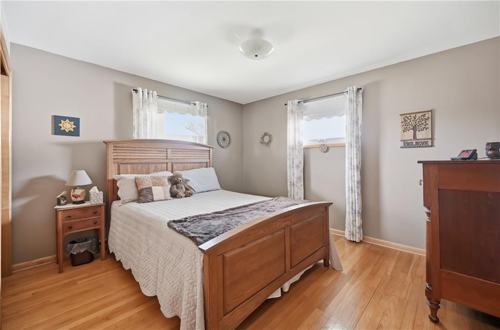 256 Donald Road Hermitage, PA 16148 - Photo 20 of 28 Bedroom #2 with double closets, hardwood floors. *Exclude draperies in this room.