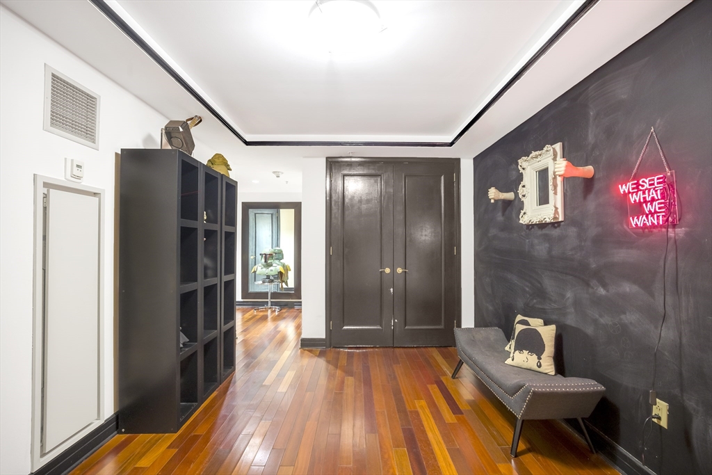 3 Avery Street, Unit 804 Boston, MA 02111 - Photo 18 of 21 a bathroom with a sink and a mirror