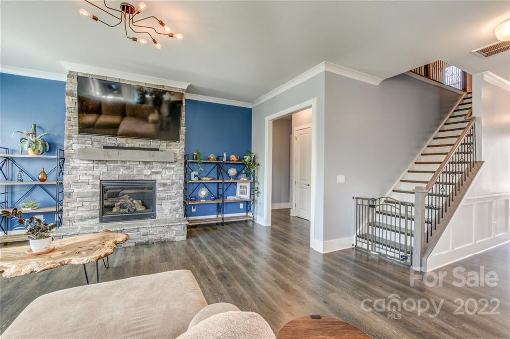 1106 Currituck Way York, SC 29745 - Photo 17 of 45 a living room with furniture and a fireplace