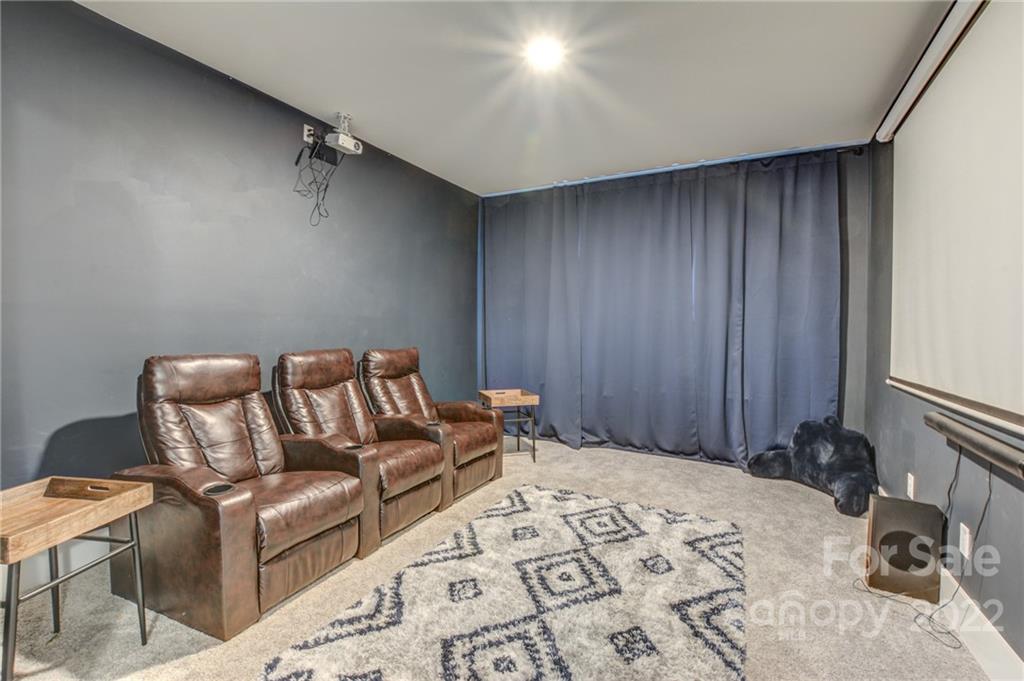 1106 Currituck Way York, SC 29745 - Photo 29 of 45 a bed room with a bed and a couch