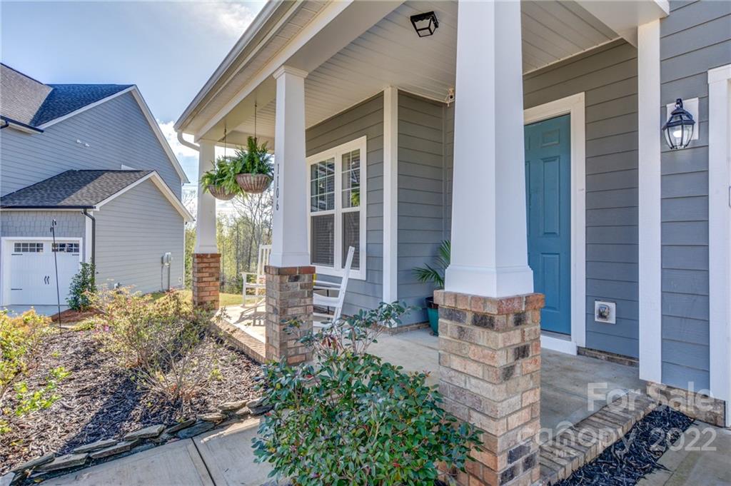 1106 Currituck Way York, SC 29745 - Photo 3 of 45 a front view of a house with garden