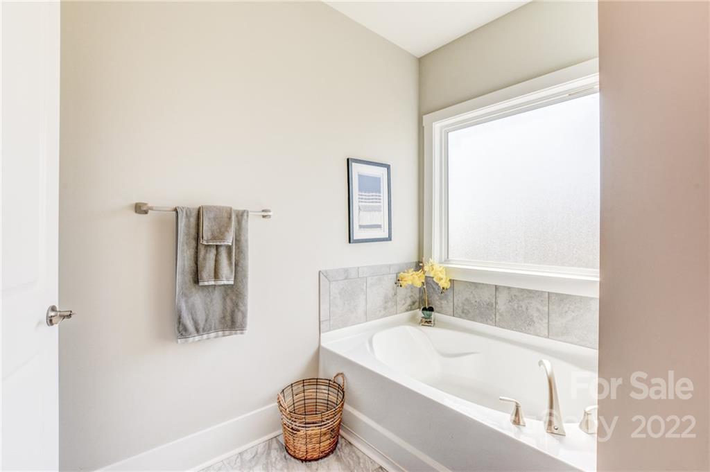 1106 Currituck Way York, SC 29745 - Photo 39 of 45 a bathroom with a tub and sink