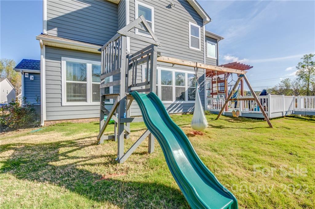 1106 Currituck Way York, SC 29745 - Photo 40 of 45 a view of a house with a backyard
