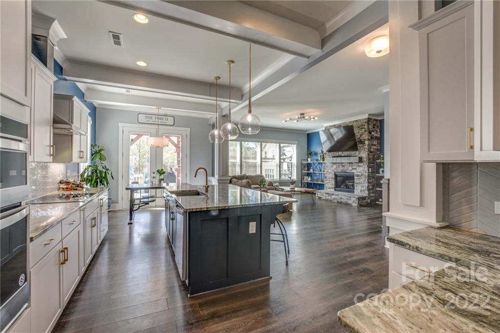 1106 Currituck Way York, SC 29745 - Photo 6 of 45 a kitchen with lots of counter top space and wooden floor