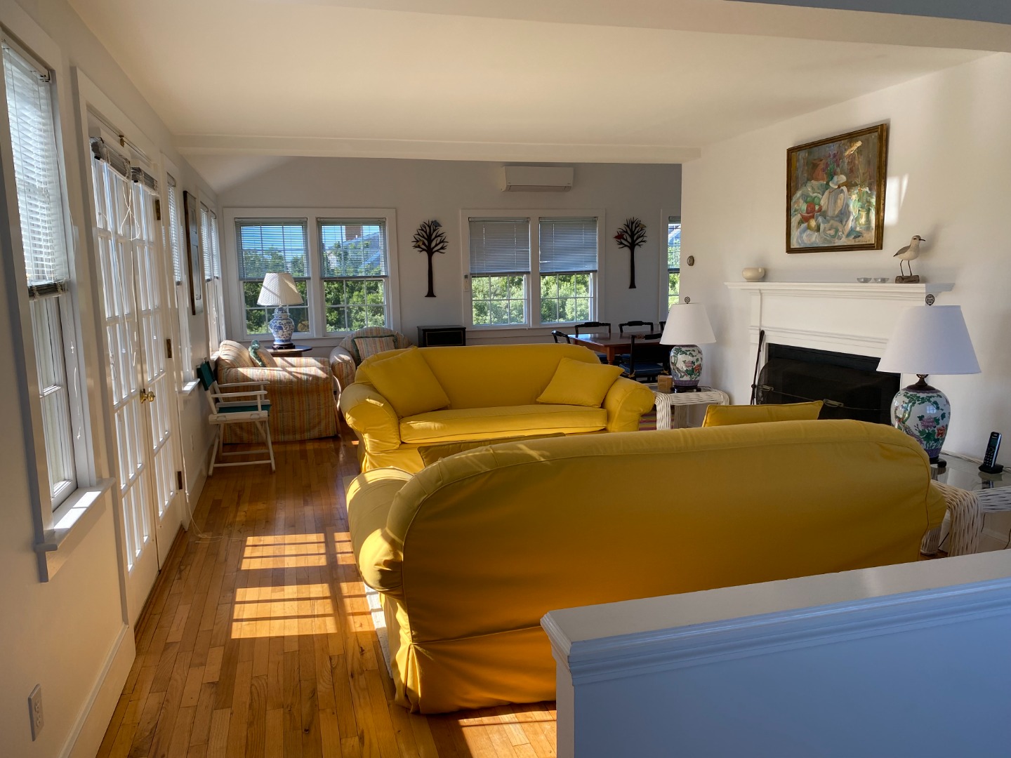 76 Baxter Road Nantucket, MA 02554 - Photo 19 of 25 a living room with furniture and a fireplace
