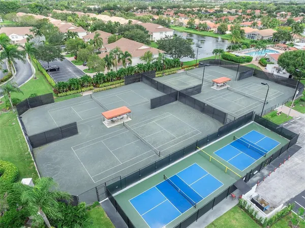 an aerial view of a pool yard patio and outdoor seating