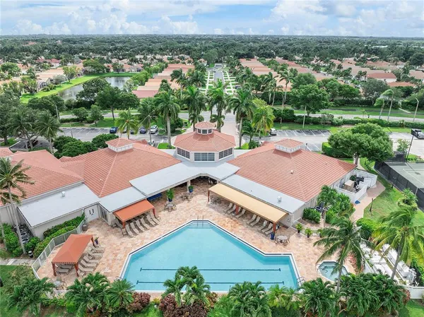 an aerial view of a house with a garden
