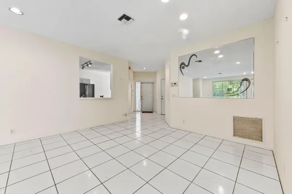 a view of an empty room and window