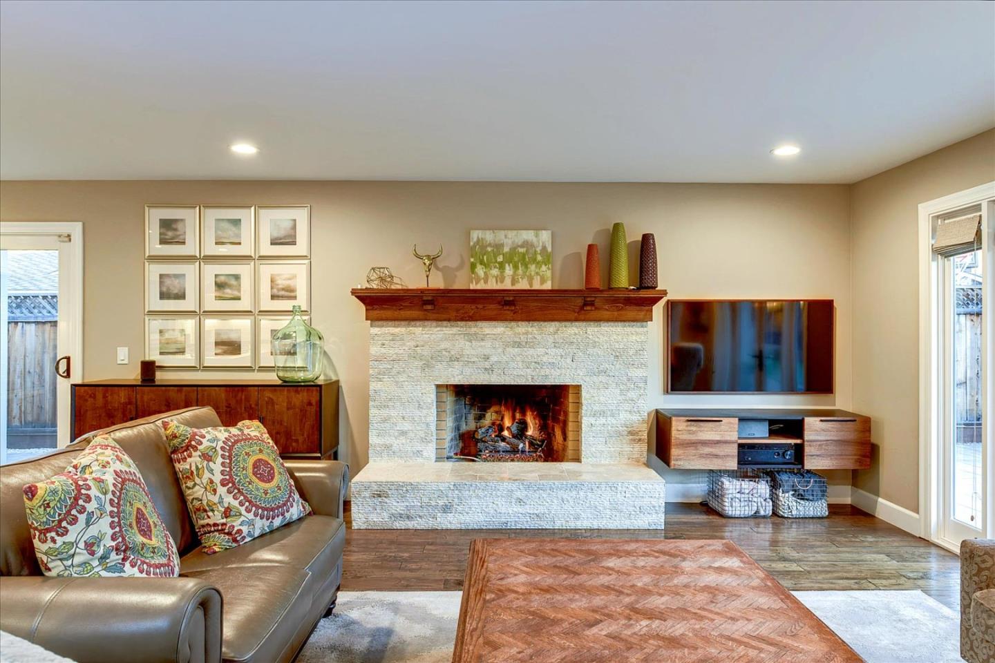 2215 Constitution Drive San Jose, CA 95124 - Photo 12 of 36 a living room with furniture and a fireplace