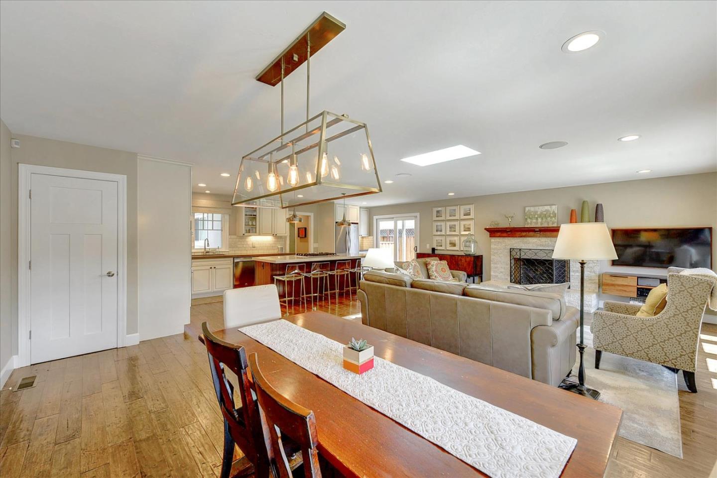 2215 Constitution Drive San Jose, CA 95124 - Photo 13 of 36 a kitchen with stainless steel appliances kitchen island granite countertop a sink and cabinets
