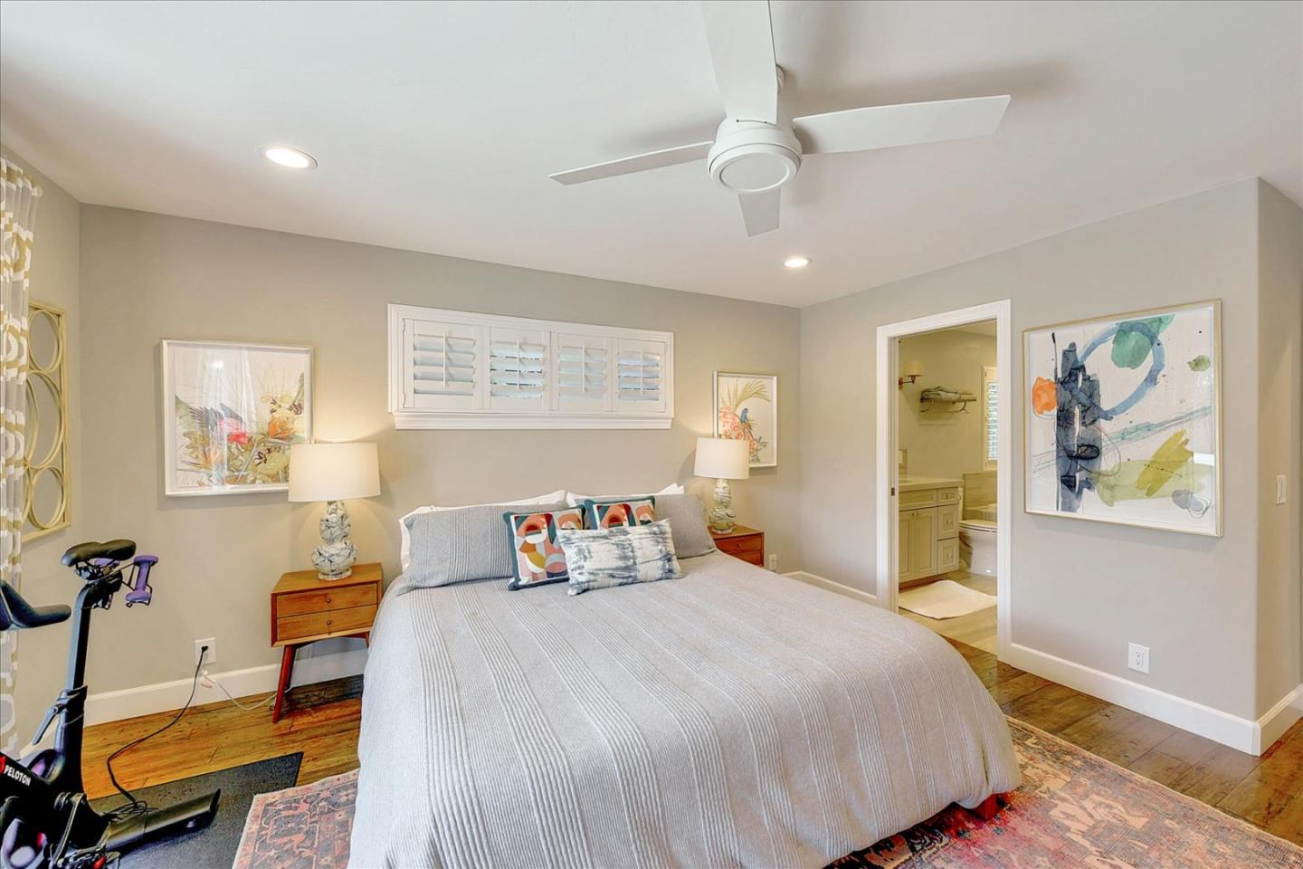 2215 Constitution Drive San Jose, CA 95124 - Photo 21 of 36 a bedroom with a bed and wooden floor