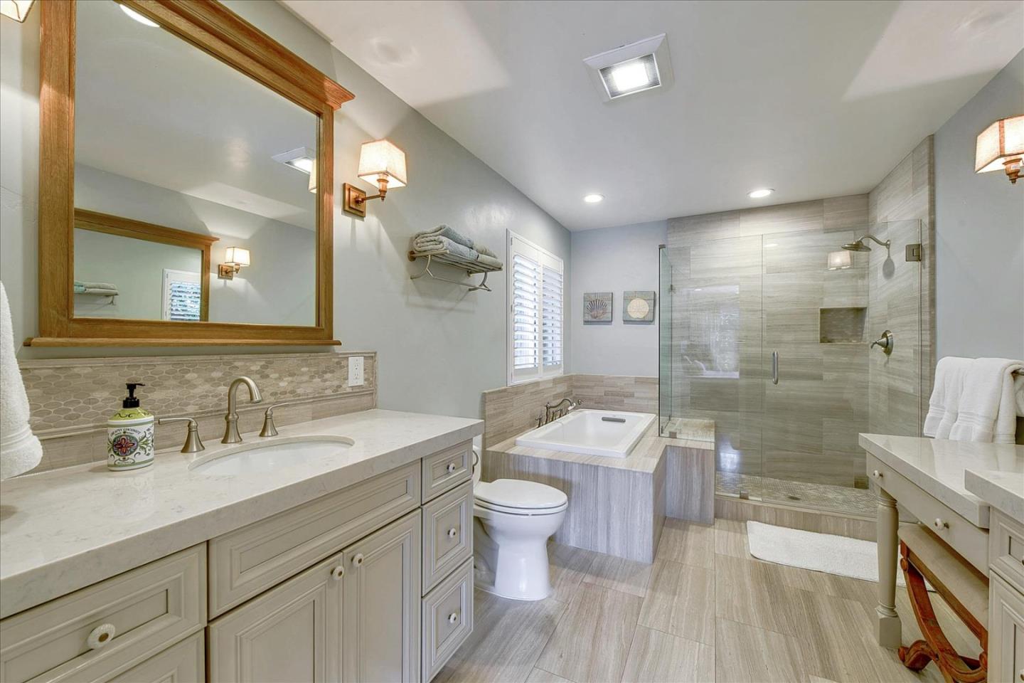 2215 Constitution Drive San Jose, CA 95124 - Photo 23 of 36 a bathroom with a double vanity sink toilet and shower
