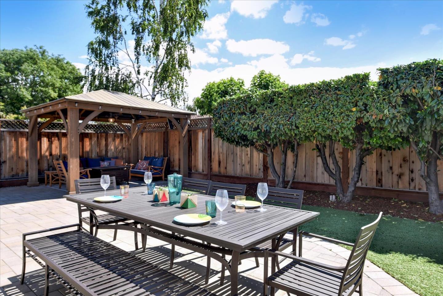 2215 Constitution Drive San Jose, CA 95124 - Photo 27 of 36 an outdoor space with furniture and umbrella