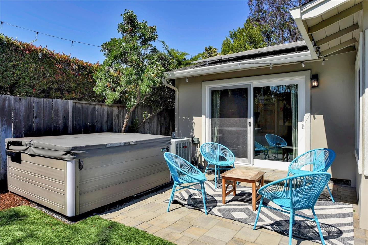 2215 Constitution Drive San Jose, CA 95124 - Photo 29 of 36 a view of a patio with table and chairs with wooden fence