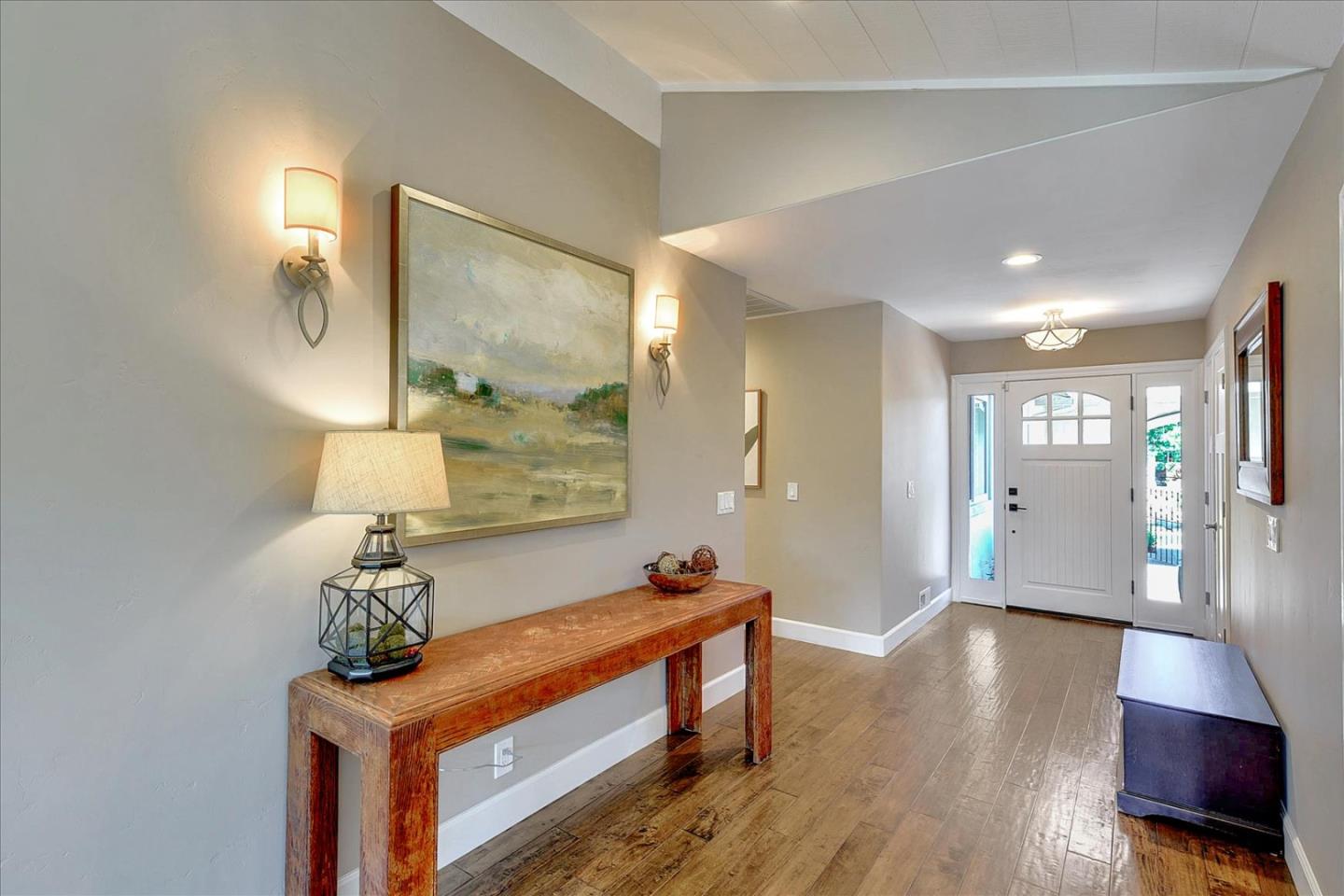 2215 Constitution Drive San Jose, CA 95124 - Photo 5 of 36 a view of a hallway with wooden floor and staircase