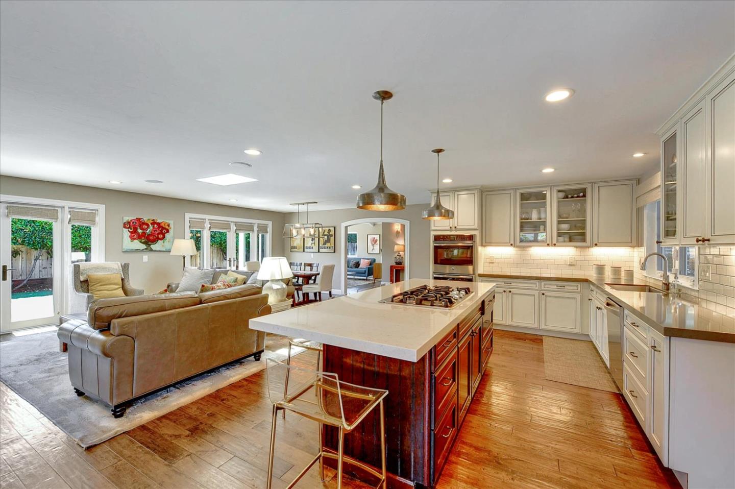 2215 Constitution Drive San Jose, CA 95124 - Photo 9 of 36 a living room with furniture a dining table and chairs
