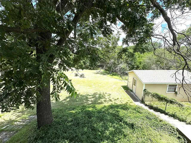 a view of a two chairs in the roof deck