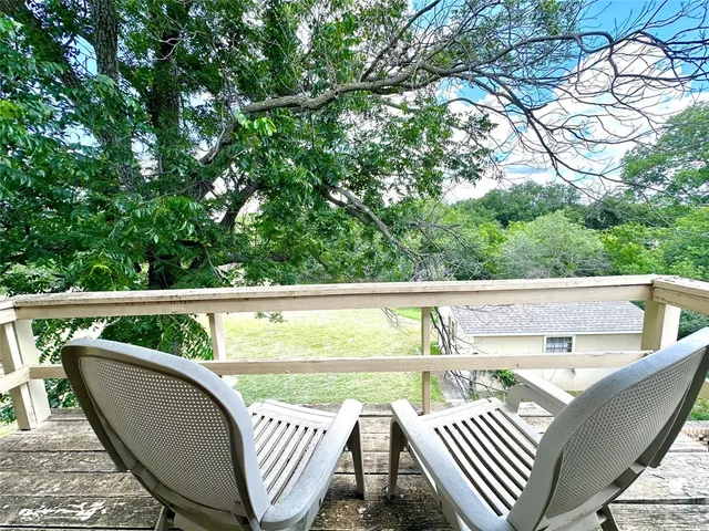 a view of a yard with a trees