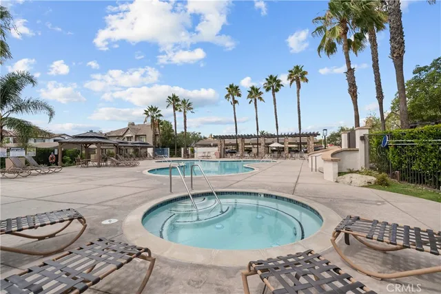 a house view with a swimming pool