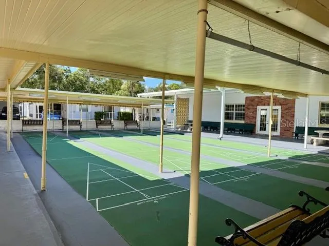 a utility room with sink dryer and washer