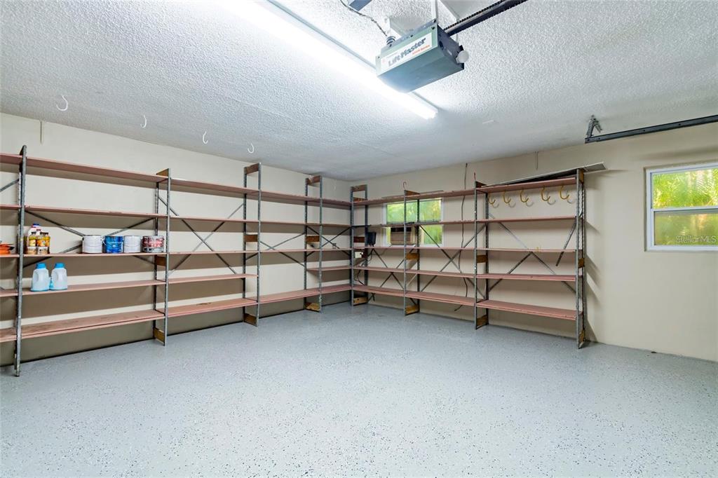 1647 Hobbit Road Dunedin, FL 34698 - Photo 17 of 36 a bedroom with bunk beds and painted walls