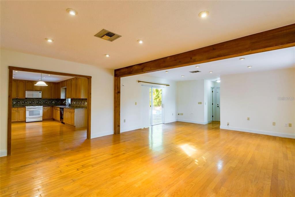 1647 Hobbit Road Dunedin, FL 34698 - Photo 21 of 36 a view of an empty room with furniture and natural light