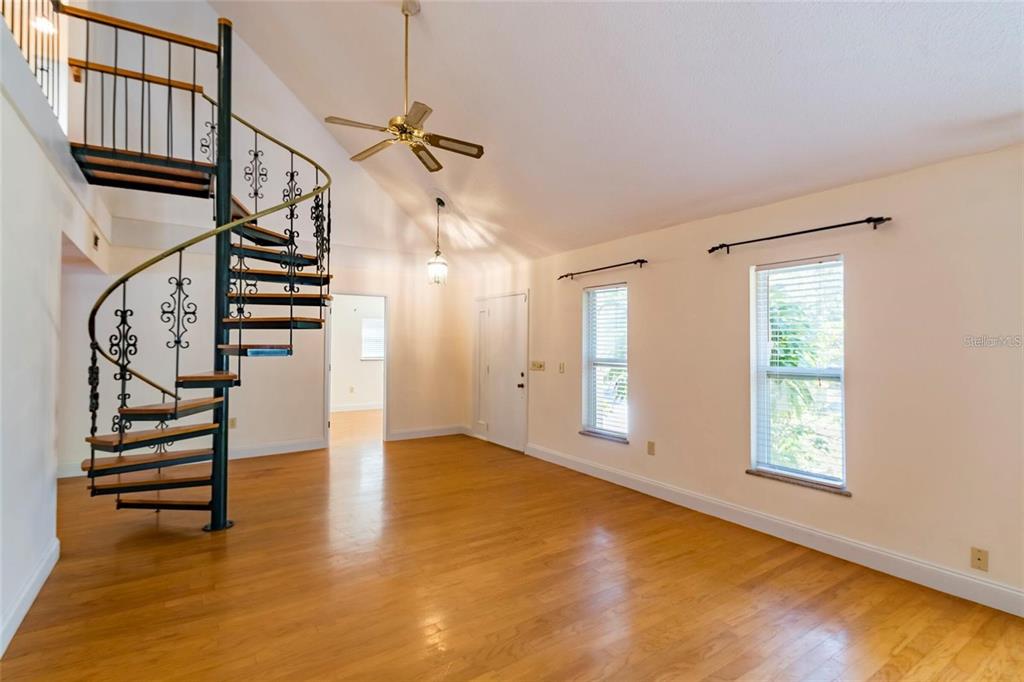 1647 Hobbit Road Dunedin, FL 34698 - Photo 30 of 36 a view of an entryway with wooden floor