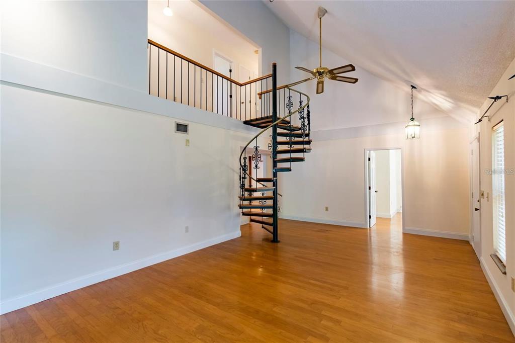 1647 Hobbit Road Dunedin, FL 34698 - Photo 31 of 36 a view of empty room with stairs