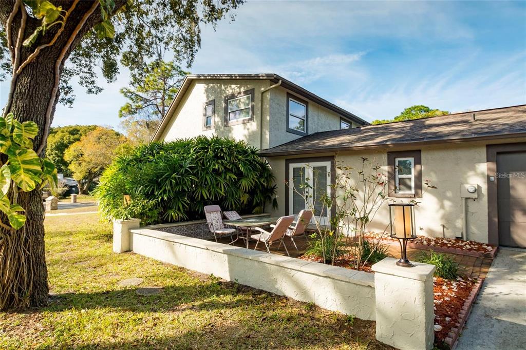 1647 Hobbit Road Dunedin, FL 34698 - Photo 5 of 36 a view of a house with swimming pool and sitting area