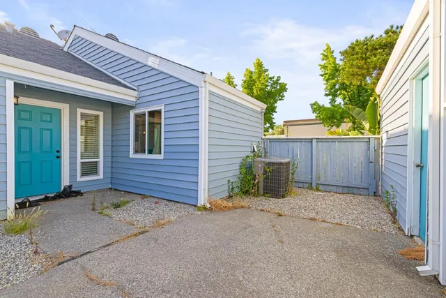 a view of front door and yard