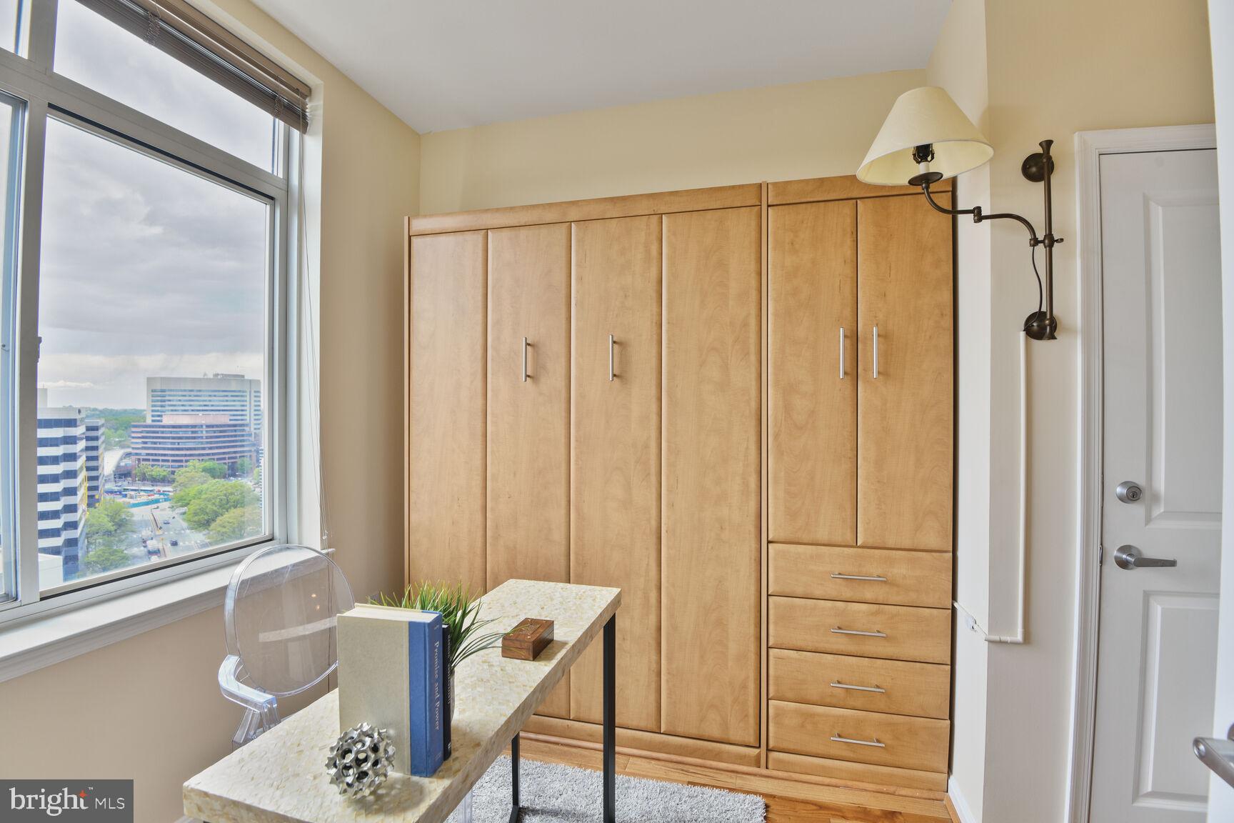 930 Wayne Avenue, Unit 1403 Silver Spring, MD 20910 - Photo 24 of 37 a view of a bathroom with a tub and shower