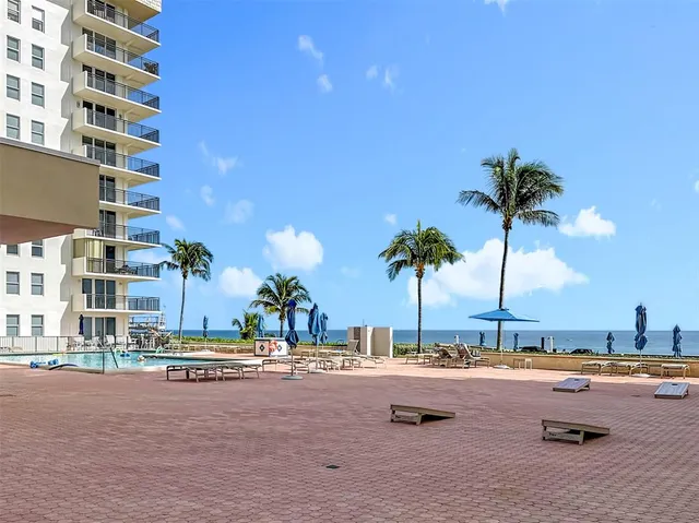 a view of a balcony with an outdoor space