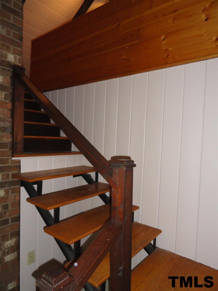 103 Oleander Road Carrboro, NC 27510 - Photo 10 of 16 Stairway leading to the loft lends way to that cottage feel
