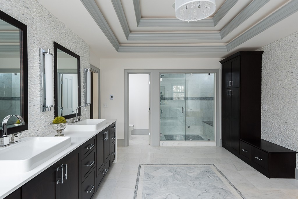 392 Main Street Hingham, MA 02043 - Photo 19 of 30 a bathroom with a double vanity sink and a mirror