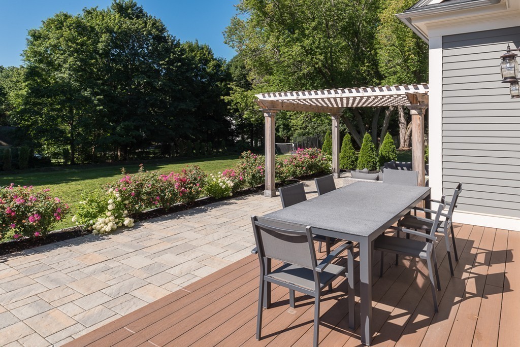 392 Main Street Hingham, MA 02043 - Photo 28 of 30 a view of a table and chairs in patio of the house
