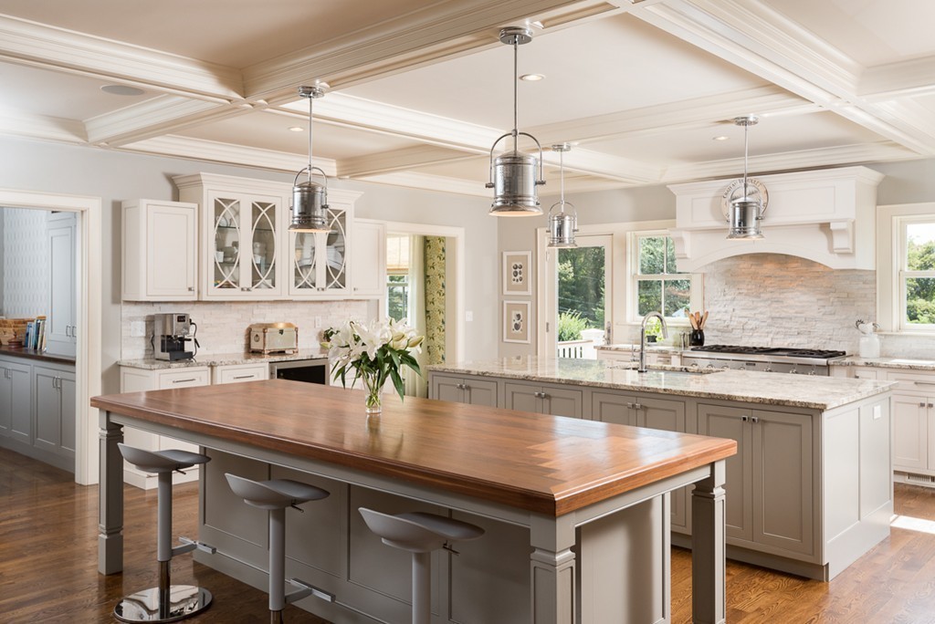 392 Main Street Hingham, MA 02043 - Photo 5 of 30 a kitchen with stainless steel appliances granite countertop a sink a stove and center island