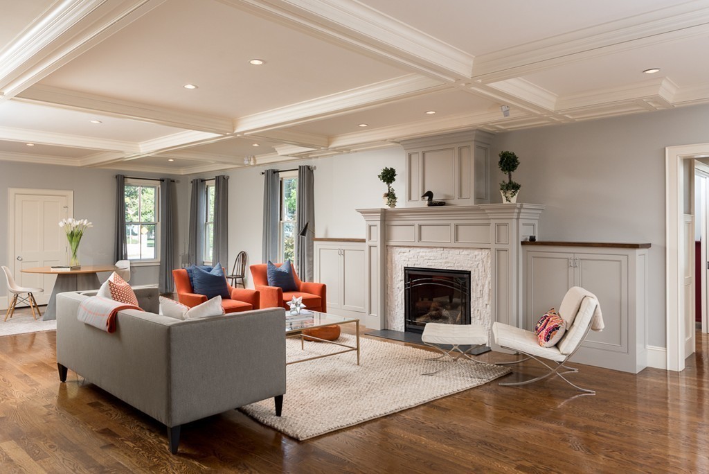392 Main Street Hingham, MA 02043 - Photo 10 of 30 a living room with furniture and a fireplace
