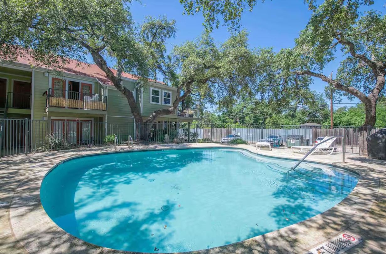 3601 Menchaca Road, Unit 107 Austin, TX 78704 - Photo 15 of 15 a view of a swimming pool with a patio