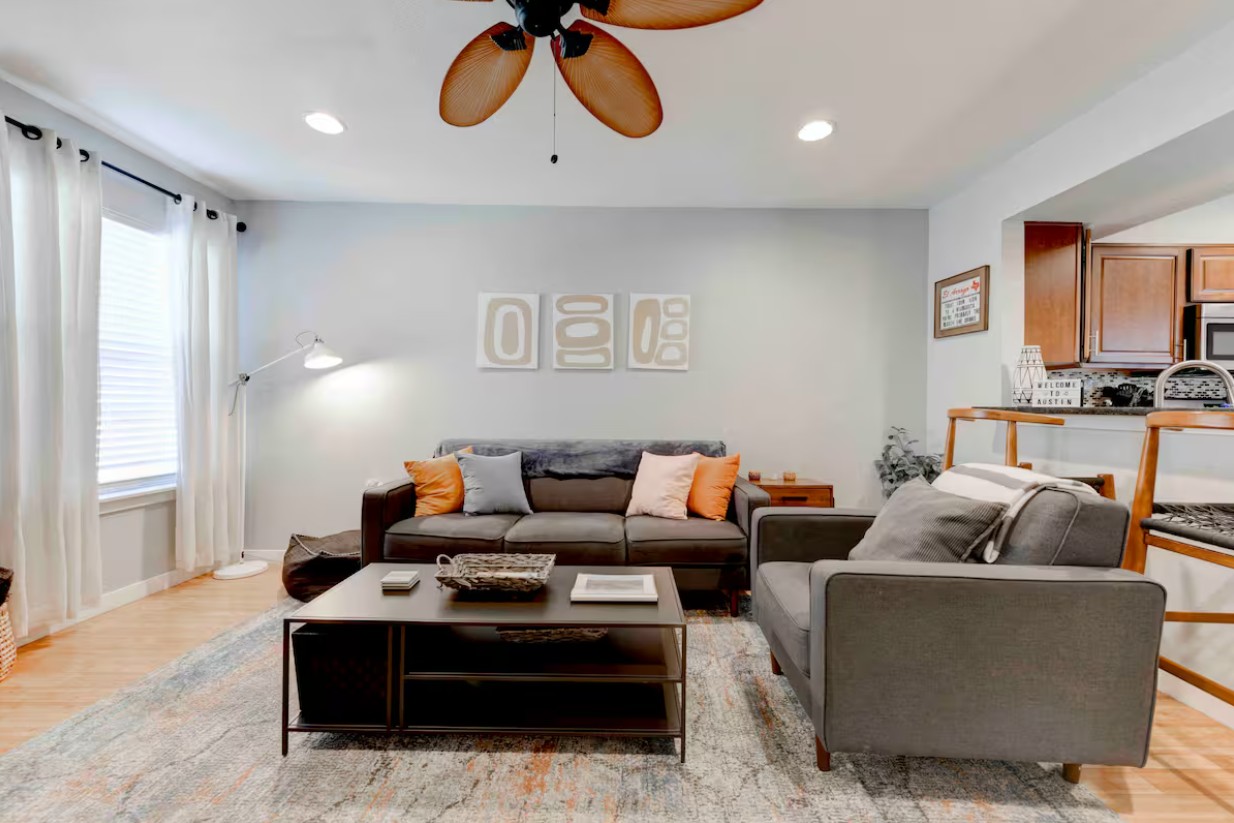 3601 Menchaca Road, Unit 107 Austin, TX 78704 - Photo 3 of 15 a living room with furniture