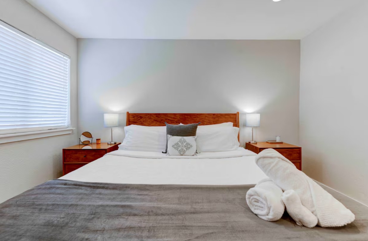 3601 Menchaca Road, Unit 107 Austin, TX 78704 - Photo 10 of 15 a bedroom with a bed and window