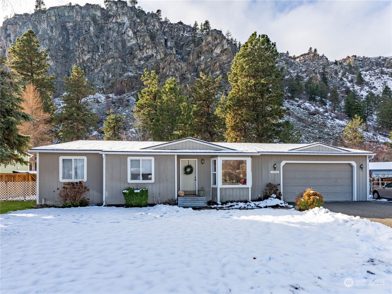 14918 Burkey Street Entiat, WA 98822 - Photo 1 of 39 a view of a house with backyard and a tree