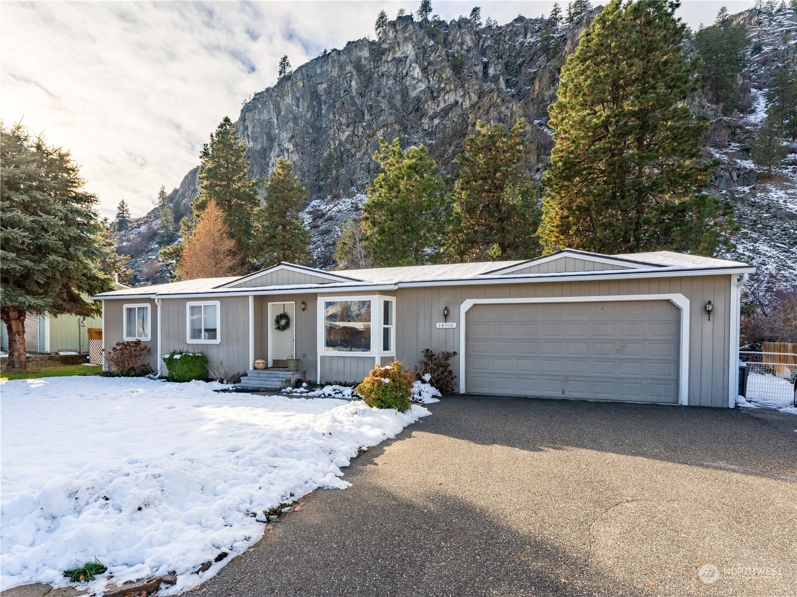 14918 Burkey Street Entiat, WA 98822 - Photo 2 of 39 a view of a house with a patio