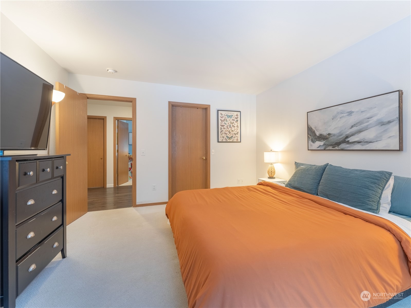 14918 Burkey Street Entiat, WA 98822 - Photo 21 of 39 a bedroom with a bed and a flat screen tv